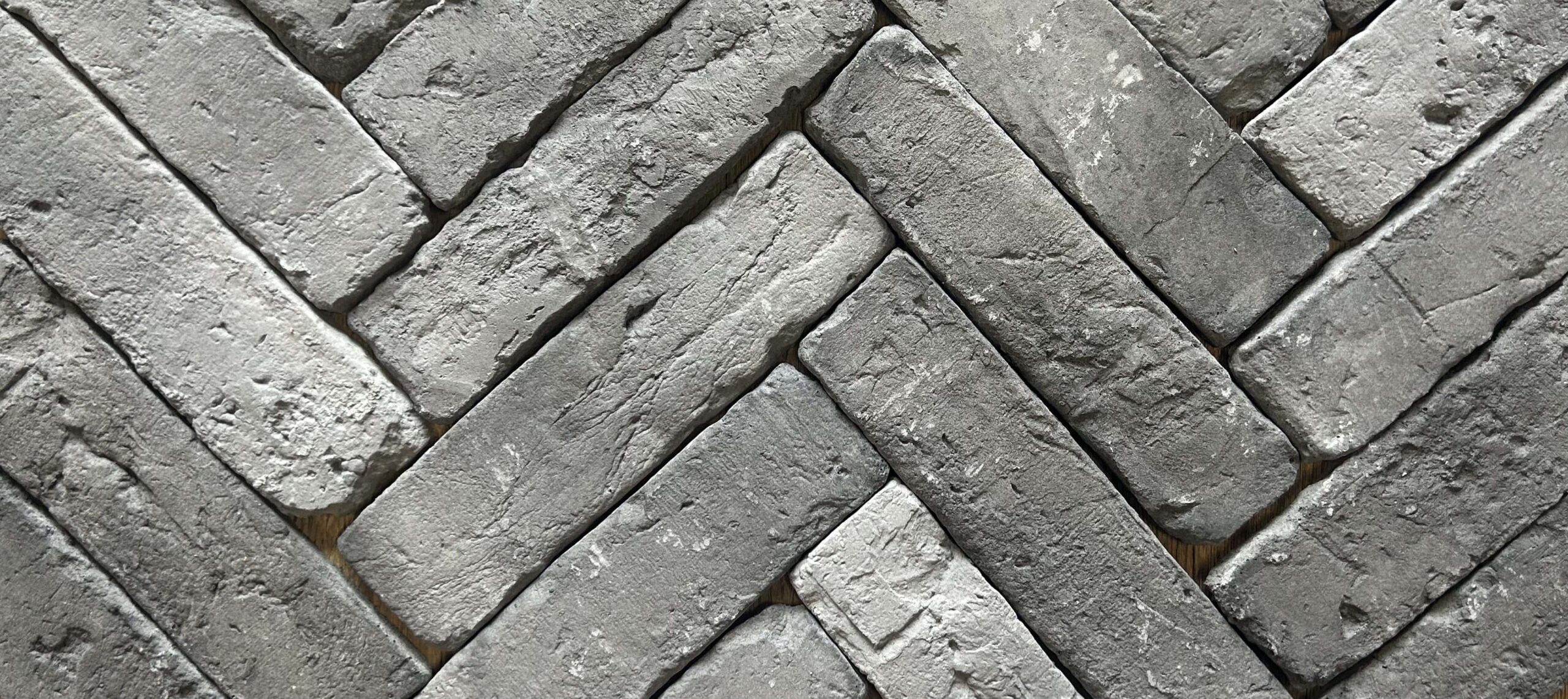 grey brick tile herringbone